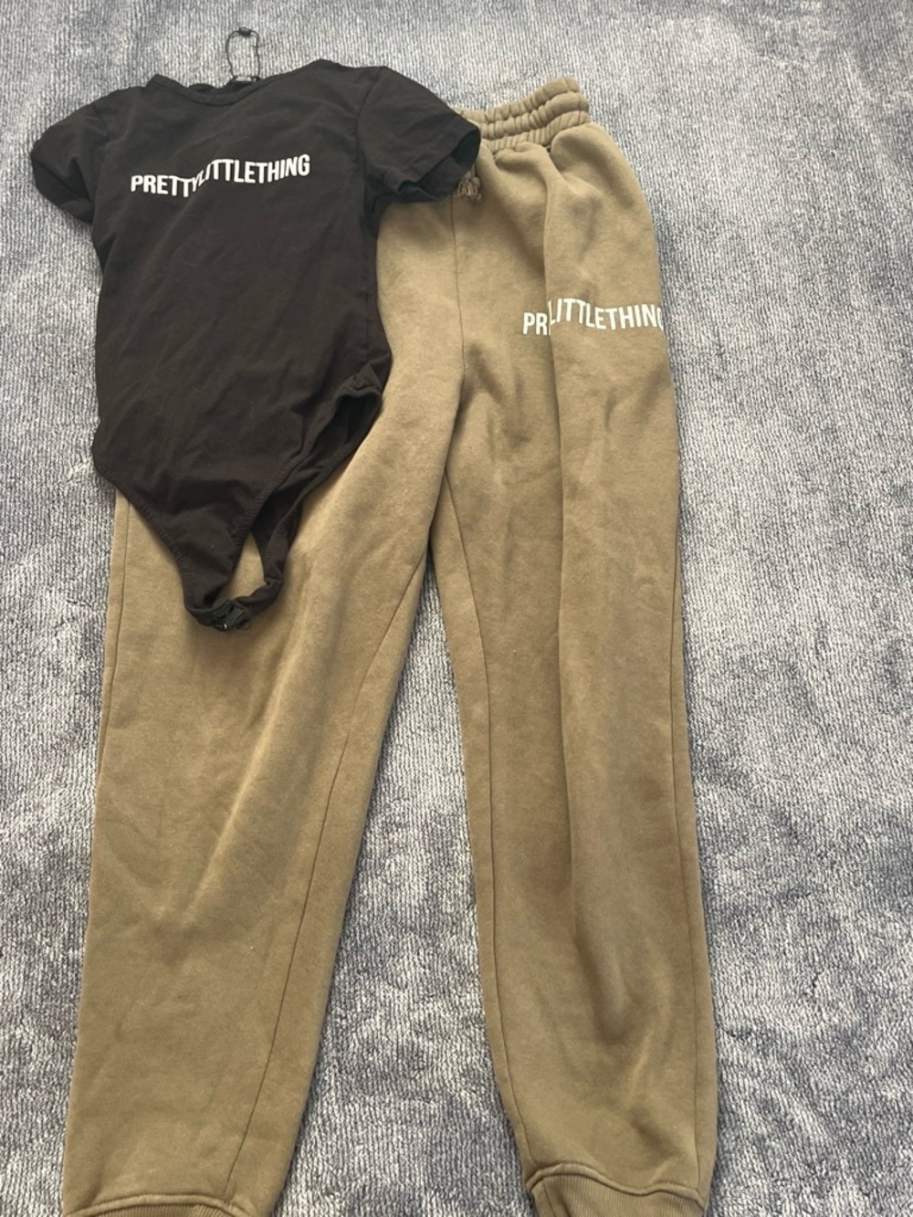 PrettyLittleThing Black Logo Bodysuit with Olive Green Joggers